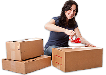 Women packing boxes for moving to storage unit